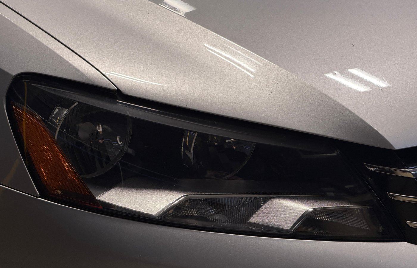 Clear and restored headlight after professional service